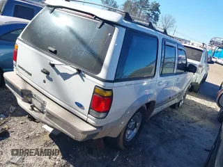 1995 Ford Explorer Eddie Bauer z VIN 1FMDU32X6SUA19810, wystawiony jako IAAI lot #41660211 z przebiegiem 151 477 mil mil oraz . Historia ofert i sprzedaży dostępna na DreamBid. Obrazek 4.