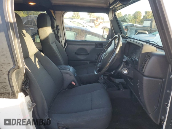 2006 Jeep Wrangler Sport Right Hand Drive with VIN 1J4F449SX6P733578, listed as a Copart auction lot 75113494 with 0 mi miles and Salvage Title. Bid and sale history available at carsss.com. Image 7.