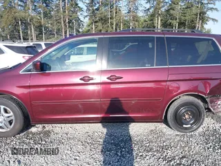 2007 Honda Odyssey EX-L z VIN 5FNRL38737B428660, wystawiony jako IAAI lot #42087846 z przebiegiem 176 479 mil mil oraz . Historia ofert i sprzedaży dostępna na DreamBid. Obrazek 14.