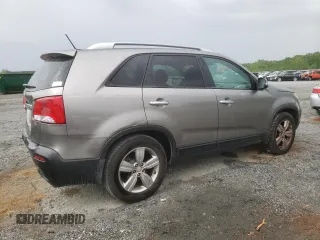 2012 Kia Sorento EX z VIN 5XYKU4A68CG209833, wystawiony jako Copart lot #53942035 z przebiegiem 216 199 mil mil oraz Szkoda całkowita • Salvage title. Historia ofert i sprzedaży dostępna na DreamBid. Obrazek 3.