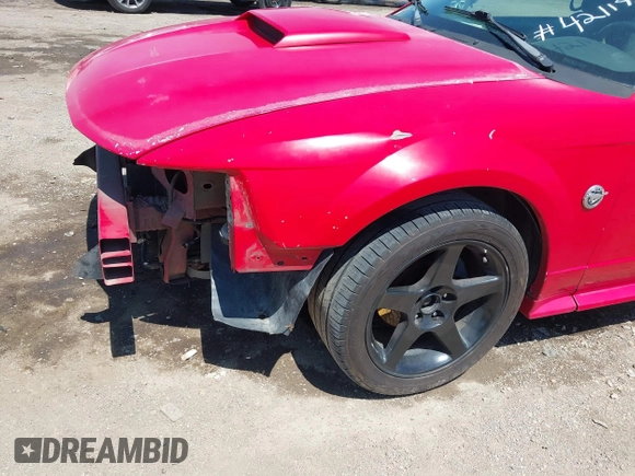 2004 Ford Mustang GT Deluxe z VIN 1FAFP42XX4F210024, wystawiony jako IAAI lot #42119586 z przebiegiem 176 164 mil mil oraz . Historia ofert i sprzedaży dostępna na DreamBid. Obrazek 12.