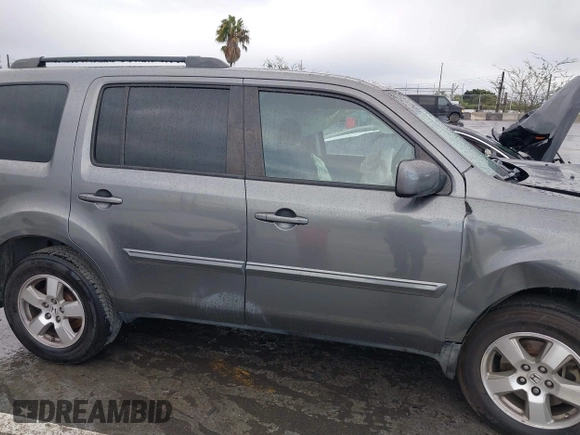 2011 Honda Pilot EX with VIN 5FNYF3H49BB026174, listed as a IAAI auction lot 41795460 with 201,488 mi miles and . Bid and sale history available at carsss.com. Image 13.