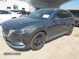 2016 Mazda CX-9 Grand Touring with VIN JM3TCADY5G0120033, listed as a IAAI auction lot 42248488 with 150,044 mi miles and . Bid and sale history available at DreamBid. Image 18.