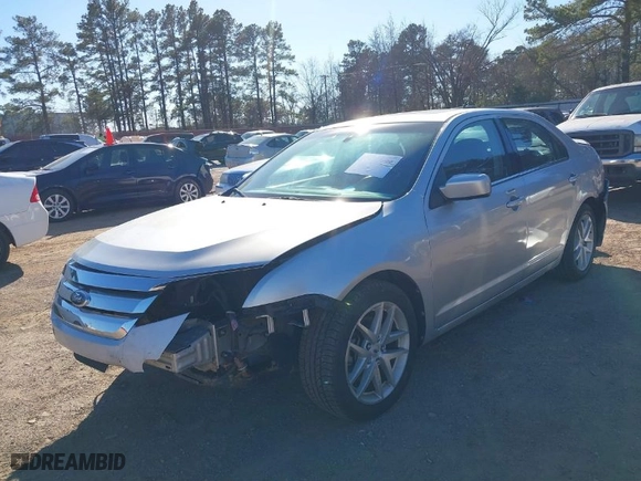 2011 Ford Fusion SEL with VIN 3FAHP0JA2BR165689, listed as a IAAI auction lot 41252799 with 163,448 mi miles. Bid and sale history available at carsss.com. Image 2.