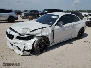 2018 BMW M2 with VIN WBS1J5C51JVD36522, listed as a Copart auction lot 61423854 with 57,933 mi miles and Salvage Title. Bid and sale history available at carsss.com. Image 1.