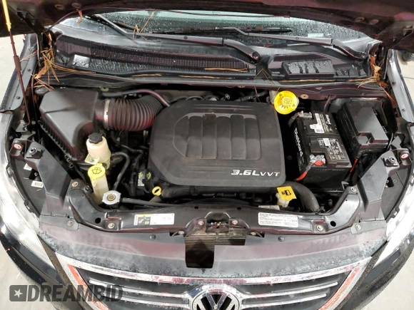 2014 Volkswagen Routan SE with VIN 2C4RVABG1ER134618, listed as a Copart auction lot 81744564 with 121,136 mi miles and Salvage title. Bid and sale history available at DreamBid. Image 12.