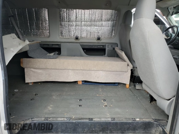 2011 Ford Econoline Passenger XL with VIN 1FBNE3BL8BDA53030, listed as a Copart auction lot 69919024 with 196,386 mi miles and Salvage Title. Bid and sale history available at DreamBid. Image 11.