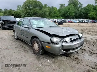 1999 Mercury Sable LS with VIN 1MEFM53U6XG646248, listed as a Copart auction lot 57859405 with 128,286 mi miles and Salvage title. Bid and sale history available at DreamBid. Image 13.