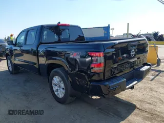 2024 Nissan Frontier SV with VIN 1N6ED1FK2RN603585, listed as a IAAI auction lot 42771501 with 8,818 mi miles and . Bid and sale history available at DreamBid. Image 3.
