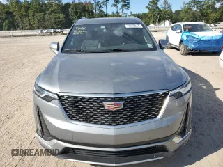 2023 Cadillac XT6 FWD Premium Luxury with VIN 1GYKPCRS0PZ231233, listed as a Copart auction lot 73210244 with 14,604 mi miles and Salvage Title. Bid and sale history available at carsss.com. Image 5.