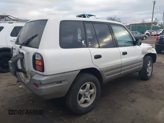 1998 Toyota RAV4 with VIN JT3GP10V9W7031439, listed as a IAAI auction lot 41489043 with 127,726 mi miles and . Bid and sale history available at DreamBid. Image 4.