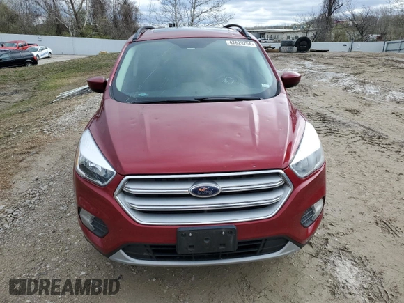 2018 Ford Escape SE z VIN 1FMCU9GD1JUC72707, wystawiony jako Copart lot #47829264 z przebiegiem 96 341 mil mil oraz Szkoda całkowita • Salvage title. Historia ofert i sprzedaży dostępna na DreamBid. Obrazek 5.