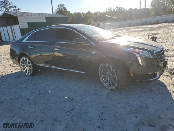 2018 Cadillac XTS Livery Package with VIN 2G61U5S30J9128214, listed as a Copart auction lot 82170414 with 111,611 mi miles and Salvage Title. Bid and sale history available at carsss.com. Image 4.