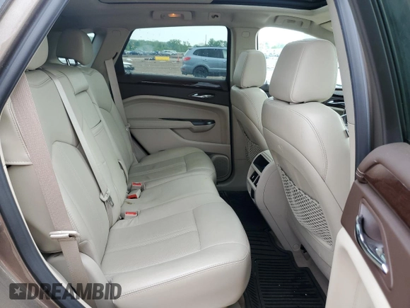 2016 Cadillac SRX Luxury Collection with VIN 3GYFNEE37GS577097, listed as a Copart auction lot 56126585 with 118,424 mi miles and Clean title. Bid and sale history available at DreamBid. Image 11.
