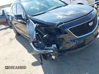2019 Cadillac XT4 FWD Sport with VIN 1GYFZER46KF125100, listed as a IAAI auction lot 42221290 with 79,491 mi miles and . Bid and sale history available at DreamBid. Image 6.