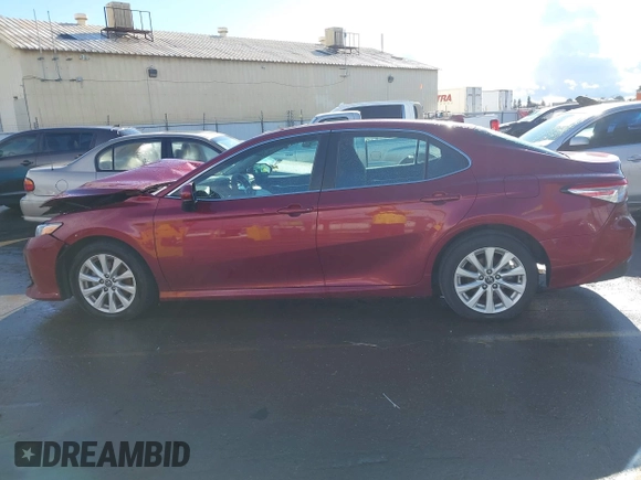 2020 Toyota Camry LE with VIN 4T1C11AK4LU916494, listed as a IAAI auction lot 41786429 with 100,032 mi miles and . Bid and sale history available at DreamBid. Image 14.