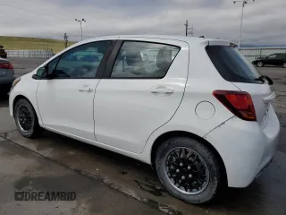 2015 Toyota Yaris L with VIN VNKKTUD32FA033118, listed as a Copart auction lot 52800075 with 111,305 mi miles and Salvage Title. Bid and sale history available at DreamBid. Image 2.