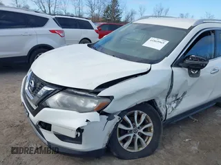 2017 Nissan Rogue S with VIN JN8AT2MVXHW017964, listed as a IAAI auction lot 41869965 with 123,544 mi miles and . Bid and sale history available at DreamBid. Image 6.