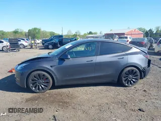 2022 Tesla Model Y Performance with VIN 7SAYGDEF9NF326944, listed as a IAAI auction lot 42111633 with Not Provided miles and . Bid and sale history available at DreamBid. Image 13.