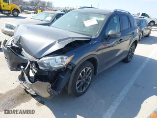 2016 Mazda CX-5 Grand Touring with VIN JM3KE4DY5G0837958, listed as a IAAI auction lot 41713313 with NaN miles. Bid and sale history available at carsss.com. Image 17.