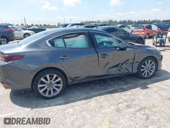 2023 Mazda 3 S Preferred with VIN 3MZBPACM8PM361196, listed as a IAAI auction lot 41940018 with 49,759 mi miles and . Bid and sale history available at DreamBid. Image 21.