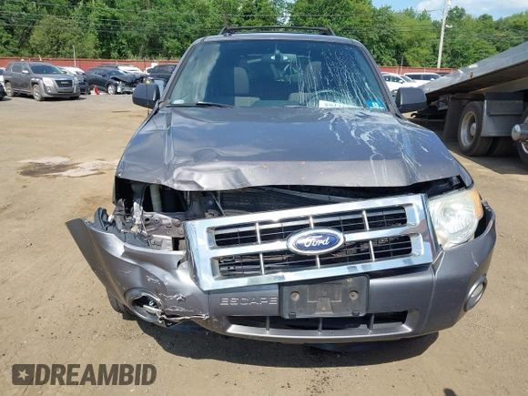 2012 Ford Escape XLT with VIN 1FMCU9D75CKC22907, listed as a IAAI auction lot 42571195 with 198,537 mi miles and . Bid and sale history available at DreamBid. Image 18.
