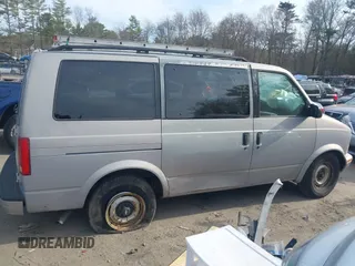2000 Chevrolet Astro z VIN 1GNDM19W1YB219270, wystawiony jako IAAI lot #42053149 z przebiegiem 202 254 mil mil oraz . Historia ofert i sprzedaży dostępna na DreamBid. Obrazek 13.
