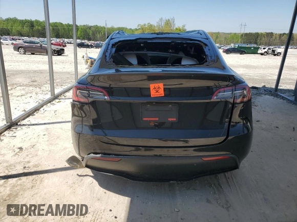2022 Tesla Model Y Performance z VIN 7SAYGDEF2NF448013, wystawiony jako Copart lot #52323435 z przebiegiem Nie podano mil oraz Nie do naprawy • Non repairable. Historia ofert i sprzedaży dostępna na DreamBid. Obrazek 6.