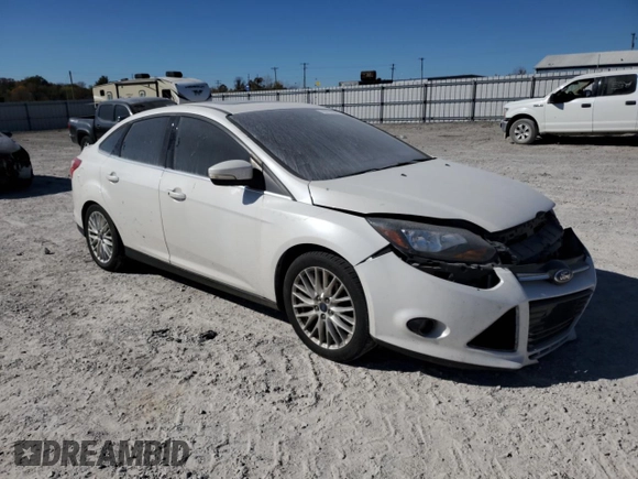 2014 Ford Focus Titanium with VIN 1FADP3J20EL122447, listed as a Copart auction lot 75774344 with 188,413 mi miles and Salvage Title. Bid and sale history available at carsss.com. Image 4.