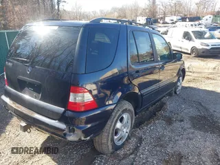 2004 Mercedes-Benz M-Class 3.5L with VIN 4JGAB57E74A468252, listed as a IAAI auction lot 41706046 with 126,119 mi miles. Bid and sale history available at carsss.com. Image 4.