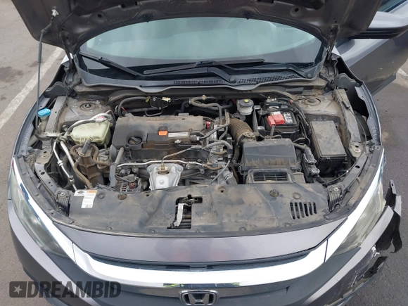 2017 Honda Civic LX with VIN 19XFC2F50HE055888, listed as a IAAI auction lot 42202494 with 147,354 mi miles and . Bid and sale history available at DreamBid. Image 10.