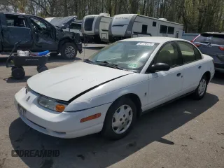 2002 Saturn SL z VIN 1G8ZH52842Z292969, wystawiony jako Copart lot #54429175 z przebiegiem 110 906 mil mil oraz Szkoda całkowita • Salvage title. Historia ofert i sprzedaży dostępna na DreamBid. Obrazek 1.