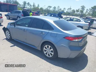 2023 Toyota Corolla LE with VIN 5YFB4MDE9PP016692, listed as a IAAI auction lot 42136141 with 34,671 mi miles and . Bid and sale history available at carsss.com. Image 3.