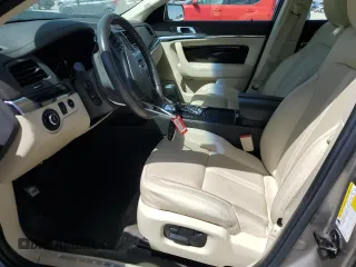 2016 Lincoln MKS z VIN 1LNHL9DK8GG600661, wystawiony jako Copart lot #49648655 z przebiegiem 56 655 mil mil oraz Szkoda całkowita • Salvage title. Historia ofert i sprzedaży dostępna na DreamBid. Obrazek 7.