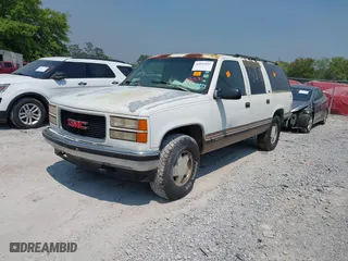 1996 GMC Suburban with VIN 1GKFK16R3TJ726521, listed as a IAAI auction lot 42055945 with 170,893 mi miles. Bid and sale history available at carsss.com. Image 2.