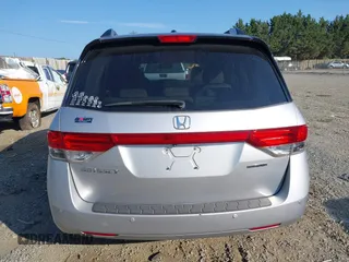 2014 Honda Odyssey Touring with VIN 5FNRL5H95EB108427, listed as a IAAI auction lot 39992643 with 100,658 mi miles and . Bid and sale history available at DreamBid. Image 16.