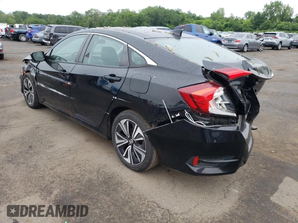 2017 Honda Civic EX-L with VIN 19XFC1F73HE201731, listed as a Copart auction lot 60104785 with 63,932 mi miles and Salvage title. Bid and sale history available at DreamBid. Image 2.
