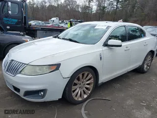 2009 Lincoln MKS with VIN 1LNHM94R09G621985, listed as a IAAI auction lot 41810163 with 147,236 mi miles. Bid and sale history available at carsss.com. Image 2.