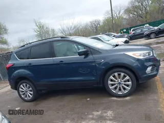 2019 Ford Escape SEL with VIN 1FMCU9HD3KUA54073, listed as a IAAI auction lot 41917955 with 101,283 mi miles. Bid and sale history available at carsss.com. Image 13.