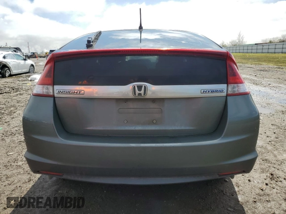 2012 Honda Insight EX z VIN JHMZE2H76CS002087, wystawiony jako Copart lot #46534815 z przebiegiem 165 422 mil mil oraz Czysty tytuł • Clean title. Historia ofert i sprzedaży dostępna na DreamBid. Obrazek 6.