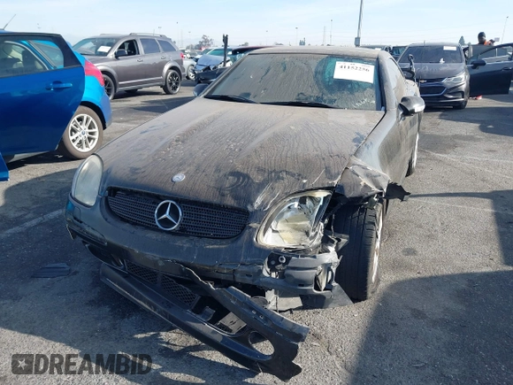 2003 Mercedes-Benz SLK 320 with VIN WDBKK65FX3F283784, listed as a IAAI auction lot 41152256 with 147,594 mi miles and . Bid and sale history available at DreamBid. Image 2.