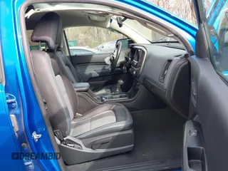 2021 Chevrolet Colorado 4WD Z71 z VIN 1GCGTDEN4M1212479, wystawiony jako IAAI lot #41937713 z przebiegiem 56 164 mil mil oraz . Historia ofert i sprzedaży dostępna na DreamBid. Obrazek 5.