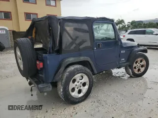 2003 Jeep Wrangler X with VIN 1J4FA39S93P315950, listed as a Copart auction lot 59563295 with Not provided miles and Salvage title. Bid and sale history available at DreamBid. Image 3.