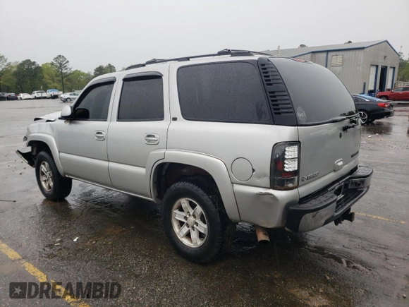 2004 Chevrolet Tahoe LT with VIN 1GNEC13Z34J124204, listed as a Copart auction lot 50416135 with 310,955 mi miles and Salvage title. Bid and sale history available at DreamBid. Image 2.