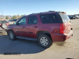 2007 GMC Yukon SLT with VIN 1GKFK13037J101824, listed as a Copart auction lot 77865294 with 179,884 mi miles and Salvage Title. Bid and sale history available at carsss.com. Image 2.