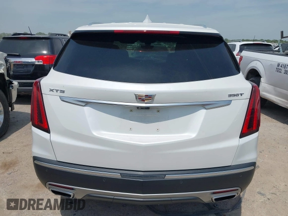 2021 Cadillac XT5 FWD Premium Luxury z VIN 1GYKNCR42MZ174309, wystawiony jako IAAI lot #42051341 z przebiegiem 75 544 mil mil oraz . Historia ofert i sprzedaży dostępna na DreamBid. Obrazek 16.