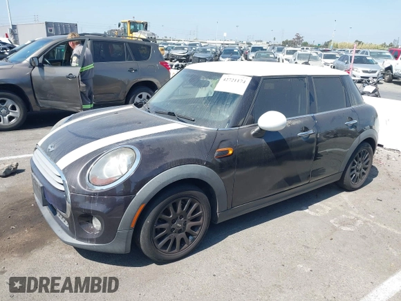 2015 MINI Hardtop 4 Door z VIN WMWXS5C55FT830653, wystawiony jako IAAI lot #42721174 z przebiegiem 126 298 mil mil oraz . Historia ofert i sprzedaży dostępna na DreamBid. Obrazek 2.