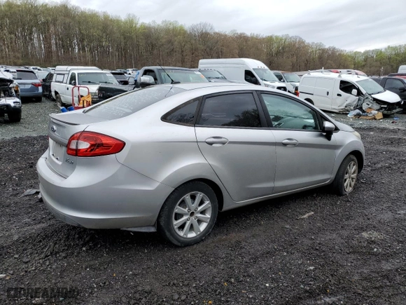 2011 Ford Fiesta SE with VIN 3FADP4BJ2BM172692, listed as a Copart auction lot 51764535 with 138,910 mi miles and Salvage Title. Bid and sale history available at carsss.com. Image 3.