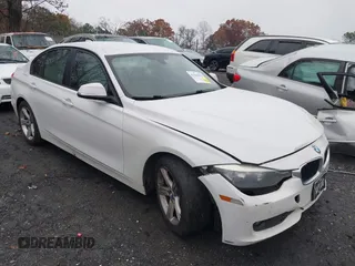 2015 BMW 3 Series 320i with VIN WBA3B1C51FP831380, listed as a IAAI auction lot 41044053 with 187,660 mi miles. Bid and sale history available at carsss.com. Image 1.