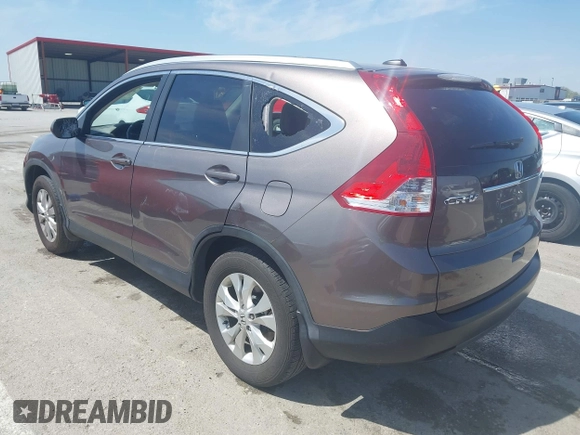 2014 Honda CR-V EX-L with VIN 5J6RM4H70EL096555, listed as a IAAI auction lot 42038062 with 113,601 mi miles. Bid and sale history available at carsss.com. Image 3.
